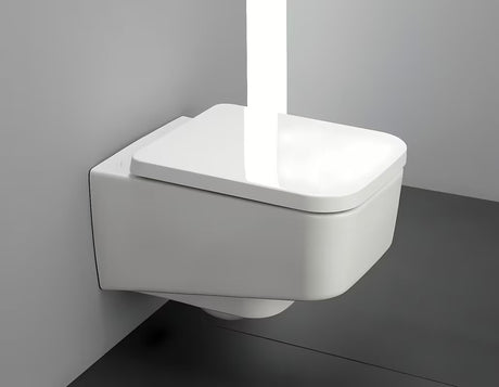 Bijeli viseća WC školjka Laufen Pro S bezrubnom izvedbom bez sustava za ispiranje i četvrtastim dizajnom.