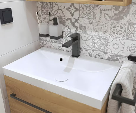 Bijeli umivaonik za kupaonski ormarić Naturel Cube Way 60 x 40 cm od lijevanog mramora s otvorom pro za slavinu u sredini