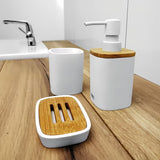 Bijeli samostojeći  držač četkica za zube Nimco Badu od polirezina (tvrda plastika).