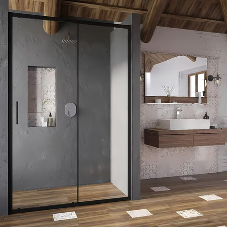 Ravak Blix Slim tuš vrata 120 cm u crnoj boji s prozirnim staklom i kliznim otvaranjem.