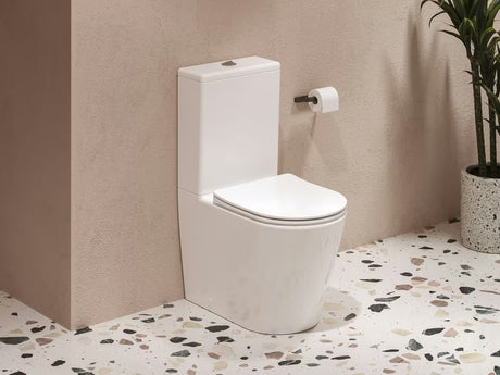 Bijeli samostojeći  WC kombi Ravak Elegant RimOff s wc daskom soft Close i dvokoličinskim ispiranjem 3/6 l.