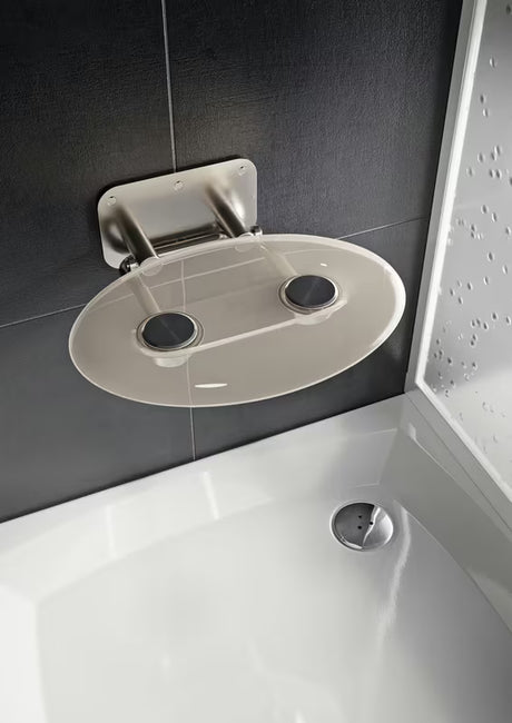 Sklopive sjedalo za tuš Ravak Ovo P II s konstrukcijom od nehrđajućeg čelika i prozirnim sjedalom Clear