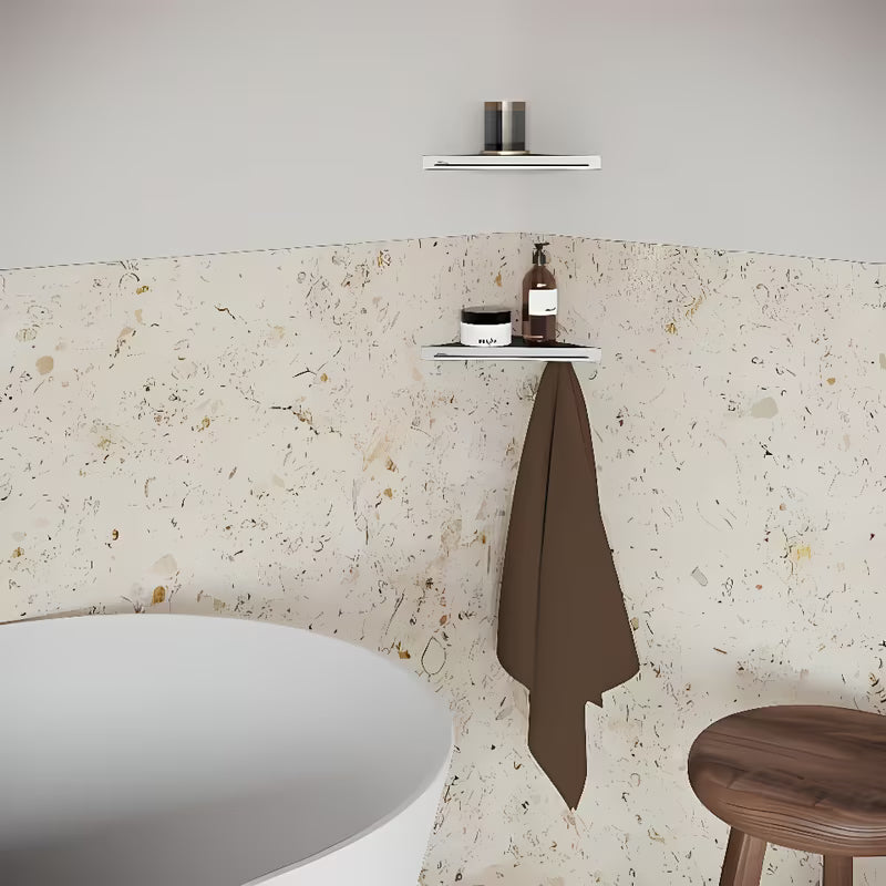 Kutna polica Ravak Slim C u izvedbi satin/krom s perforiranom površinom i donjim kukicama