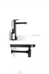 Bijeli keramički ugradbeni umivaonik Ravak Yard sa sniženom odlagališnom površinom na stražnjem dijelu