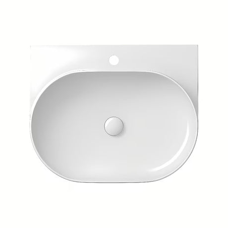 Ugradbeni keramički umivaonik Ravak Yard bijeli, ovalnog oblika i s uvučenom odlagališnom plohom.