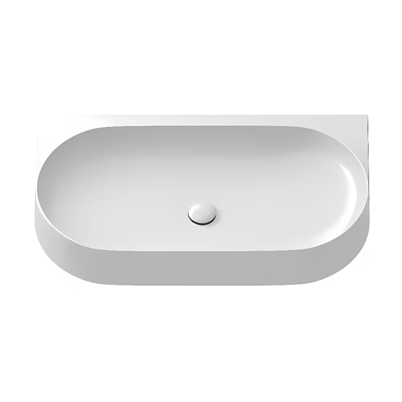 Bijeli keramički ugradbeni umivaonik Ravak Yard 80,5x50 cm s minimalističkim oblikom i odlagališnom plohom