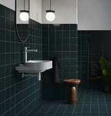 Bijeli keramički viseći umivaonik Ravak Yard 60 bez preljeva s otvorom pro za stojeću slavinu.