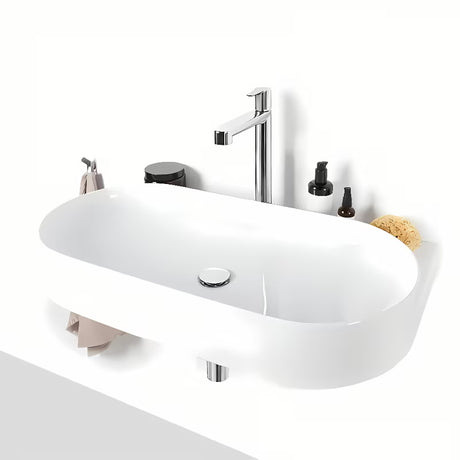 Bijeli tankostijeni keramički viseći umivaonik Ravak Yard 80 bez preljeva s otvorom pro za stojeću slavinu.