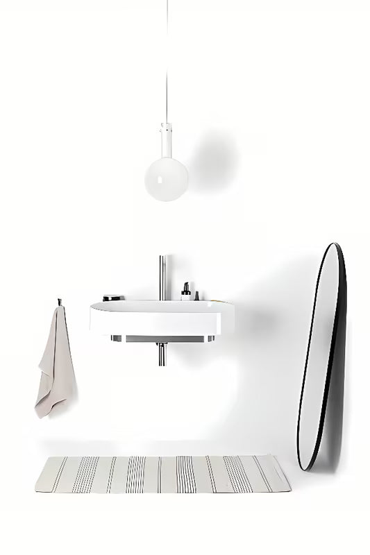 Bijeli tankostijeni keramički viseći umivaonik Ravak Yard 80 bez preljeva s otvorom pro za stojeću slavinu.