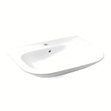 Bijeli viseće keramički umivaonik Roca Nexo s preljevom i otvorom pro za slavinu u sredini