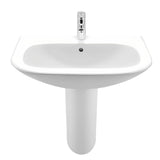 Bijeli viseće keramički umivaonik Roca Nexo s preljevom i otvorom pro za slavinu u sredini