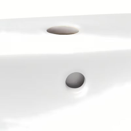 Keramički viseći umivaonik Roca Nexo bijele boje s preljevom i otvorom pro za slavinu u sredini