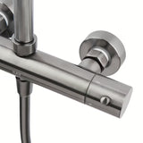 Tuš sustav SAT Aurum s termostatskom miješalicom u brušenoj izvedbi gun metal s nadglavnim i ručnim tušem.