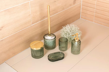 Zeleni samostojeći  dozator sapuna SAT Boho sa zaobljenim oblikom i sjajnom površinom od metala i stakla.