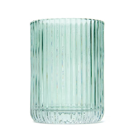 Zelena staklena čaša SAT Boho u samostojećoj izvedbi pro kupaonicu.