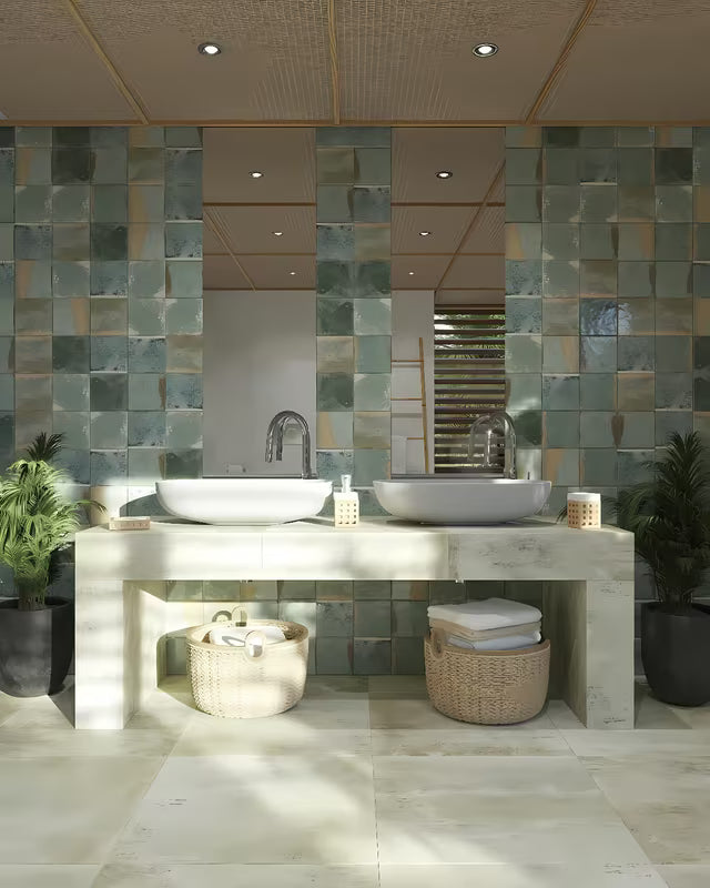 Sivi betonski umivaonik na ploču SAT Cemento 65x35 cm zaobljenog oblika i tankih stijenki.