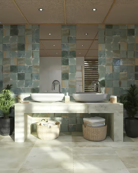 Sivi betonski umivaonik na ploču SAT Cemento 65x35 cm zaobljenog oblika i tankih stijenki.