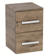 Niska kupaonski ormarić SAT Cube Way u dekoru hrasta wellington s dvije ladice i kromiranim ručkicama.