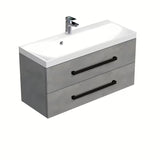 Viseća kupaonski ormarić s umivaonikom SAT Cube Way u dekoru imitacije betona s crnim mat ručkicama.