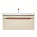 Viseća kupaonski ormarić SAT Fusion s umivaonikom u mat pješčano bež boji i s obrubom od oraha.