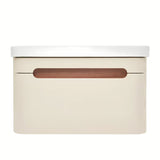 Viseća ormarić s umivaonikom SAT Fusion u mat pješčano bež boji s utičnicom i s bijelim sjajnim umivaonikom.