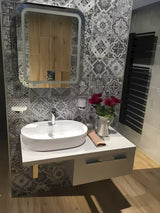 Bijeli keramički ovalni umivaonik na ploču SAT Infinitio 60 x 40 cm bez preljeva s otvorom za pro slavinu