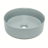 Okrugli umivaonik na ploču SAT Mood u mat sivoj boji, bez otvora za miješalicu i bez preljeva.