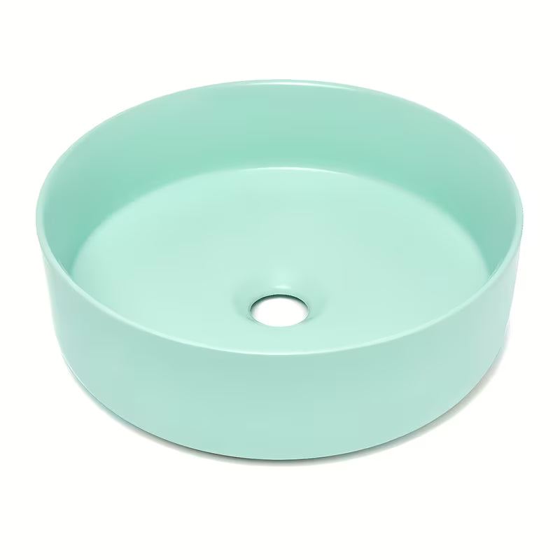 Okrugli keramički umivaonik na ploču SAT Mood u mat mint boji bez otvora za miješalicu i bez preljeva.