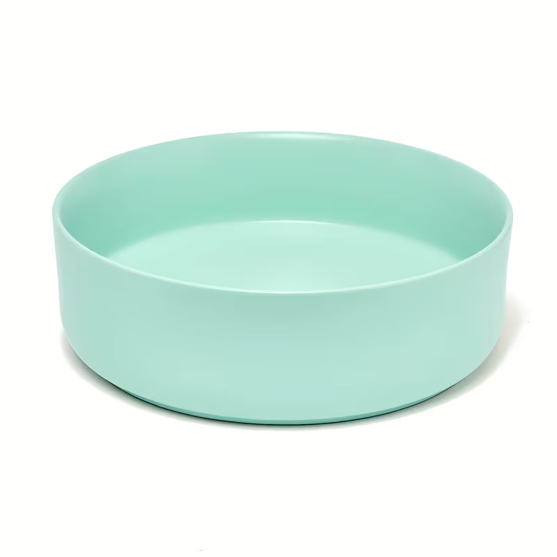 Okrugli keramički umivaonik na ploču SAT Mood u mat mint boji bez otvora za miješalicu i bez preljeva.
