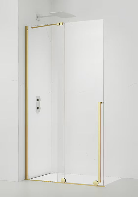 Walk-in tuš stijena SAT Xmotion 110 cm u sjajnoj zlatnoj boji s prozirnim staklom i bezokvirnom izvedbom.