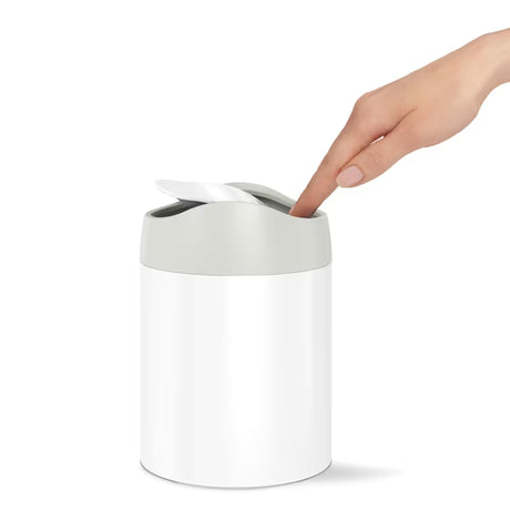 Stolni kanta za otpad Simplehuman Mini bin u izvedbi bijeli čelik s preklopnim poklopcem