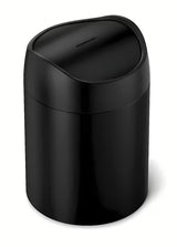 Crni stolni kanta za otpad Simplehuman Mini s preklopnim poklopcem i zapreminom 1,5 l.
