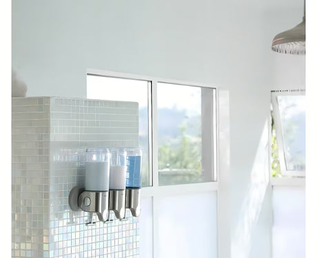 Zidni dozator sapuna Simplehuman Wall s tri prozirne posudice od brušenog čelika.