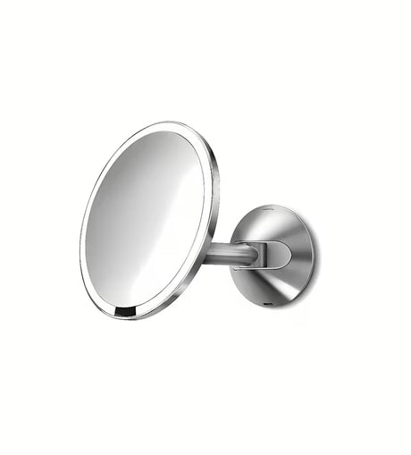 Zidno kozmetičko ogledalo Simplehuman Wall s Tru-lux LED osvjetljenjem u sjajnoj čeličnoj izvedbi.