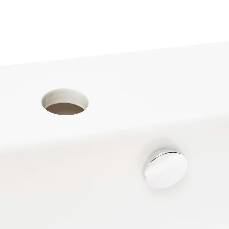 Bijeli viseći umivaonik Vitra Integra 60x36 cm od keramike s otvorom pro za slavinu u sredini i preljevom.