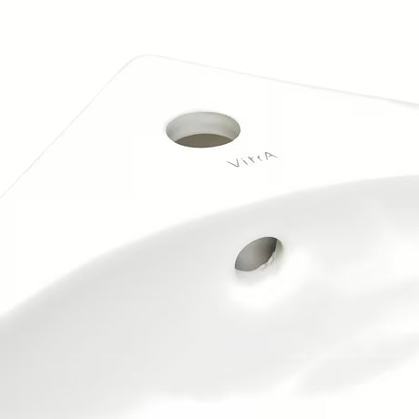 Bijeli kutne mali umivaonik vitra Integra 56x40 cm s preljevom i otvorom pro za slavinu u sredini