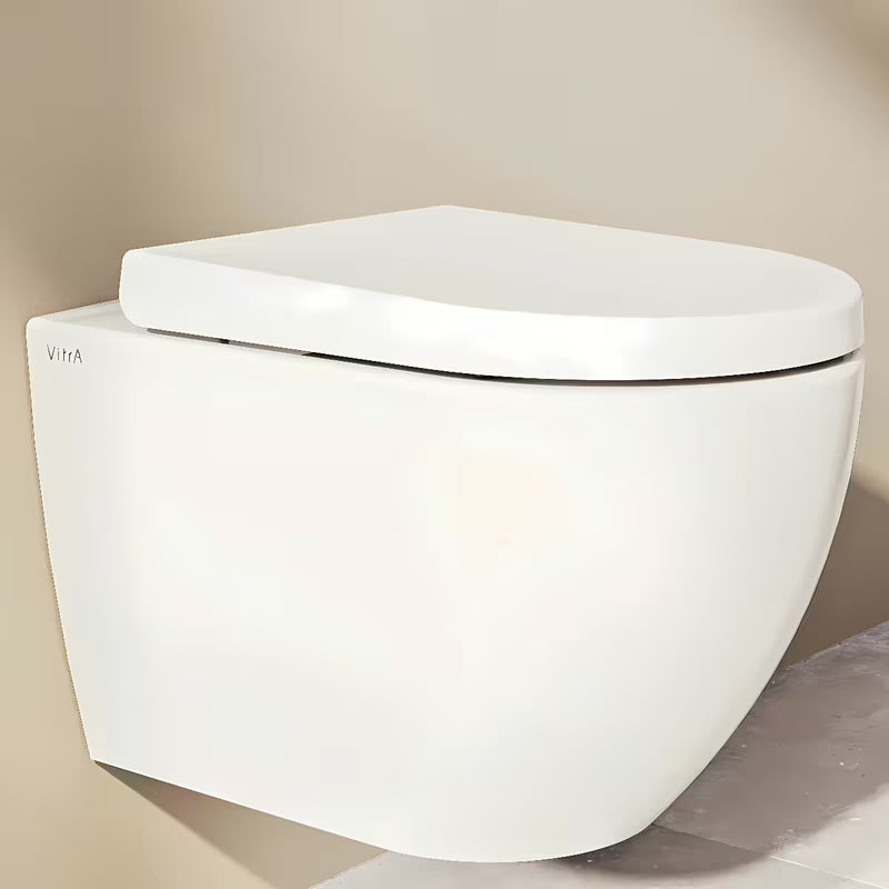 Bijelo WC daska Vitra Integra od duroplasta s metalnim šarkama i skrivenim pričvršćenjem