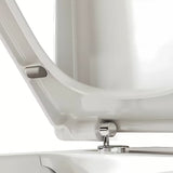 Bijelo WC daska Vitra Integra od duroplasta s metalnim šarkama i skrivenim pričvršćenjem