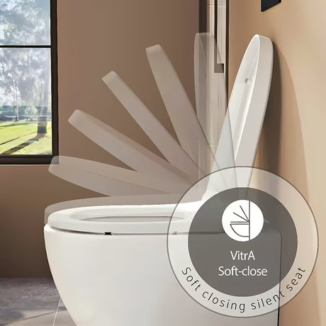 Bijelo WC daska Vitra Integra od duroplasta sa soft Close i metalnim šarkama sa skrivenim pričvršćenjem.