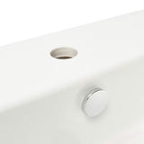 Bijeli viseće keramički umivaonik vitra Integra 55x45 cm s otvorom pro za slavinu u sredini i preljevom.