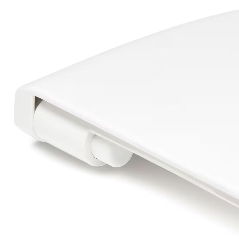 Bijelo WC daska Vitra Normus s tehnologijom soft Close, EasyLock i metalnim šarkama sa skrivenim pričvršćenjem.