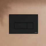 Crne mat tipka za aktiviranje Vitra Root Square pro vodokotlića vitra s mehaničkim dvokoličinskim ispiranjem.