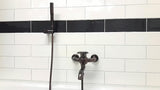 WF Industrial jednoručna baterija zidna miješalica za kadu s tuš setom u završnoj obradi uljem trljana bronca dark-metal.
